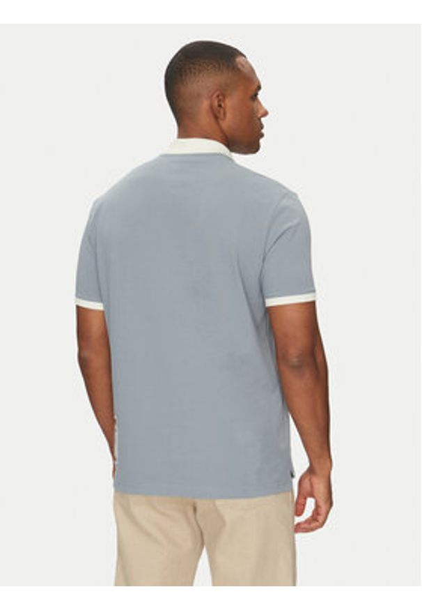 Champion Polo 221044 Niebieski Regular Fit. Typ kołnierza: polo. Kolor: niebieski. Materiał: bawełna