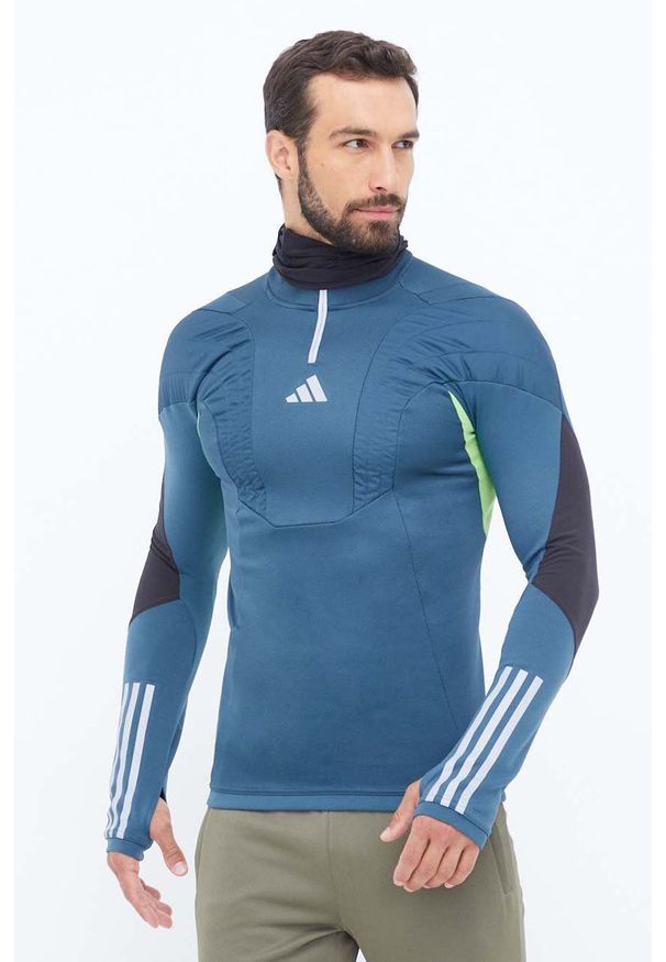adidas Performance bluza treningowa Tiro 23 Competition Winterized kolor turkusowy wzorzysta. Kolor: turkusowy. Materiał: skóra, materiał. Długość: krótkie