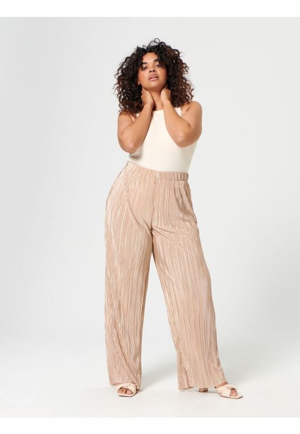 Sinsay - Spodnie plisowane - złoty. Kolor: złoty