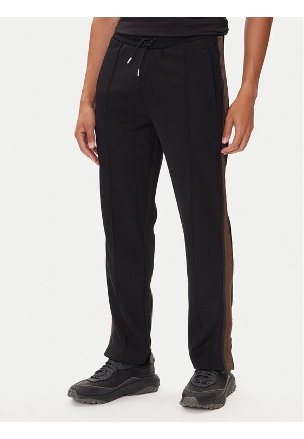 Hugo - HUGO Spodnie dresowe Derwent 50542819 Czarny Regular Fit. Kolor: czarny. Materiał: syntetyk