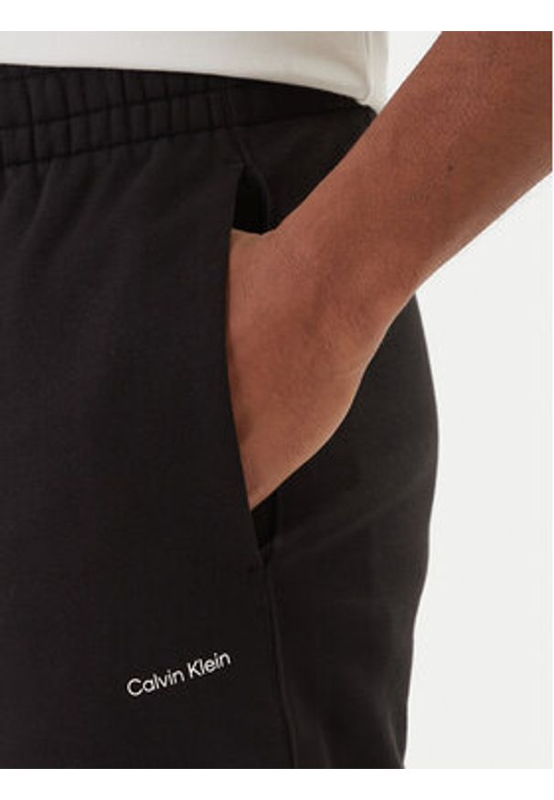 Calvin Klein Spodnie dresowe Nano Standard Logo LV04LF247G Czarny Regular Fit. Kolor: czarny. Materiał: bawełna