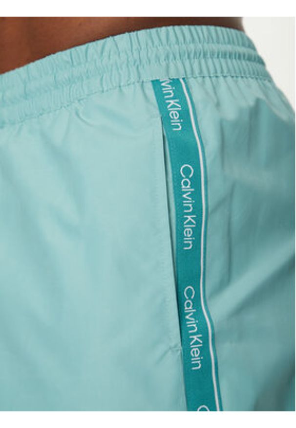 Calvin Klein Swimwear Szorty kąpielowe KM0KM01109 Błękitny Regular Fit. Kolor: niebieski. Materiał: syntetyk