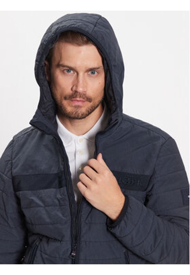 TOMMY HILFIGER - Tommy Hilfiger Kurtka przejściowa MW0MW31639 Granatowy Regular Fit. Kolor: niebieski. Materiał: syntetyk