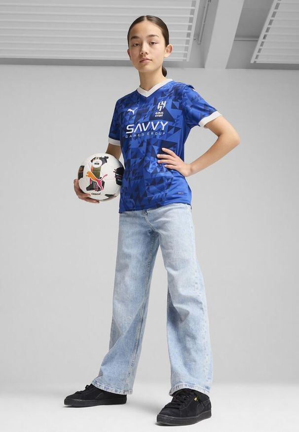 Puma - Al Hilal Saudi F.C. Młodzieżowa koszulka domowa Stade Rennais F.C. 24/25 PUMA. Kolor: biały, wielokolorowy, niebieski. Wzór: aplikacja