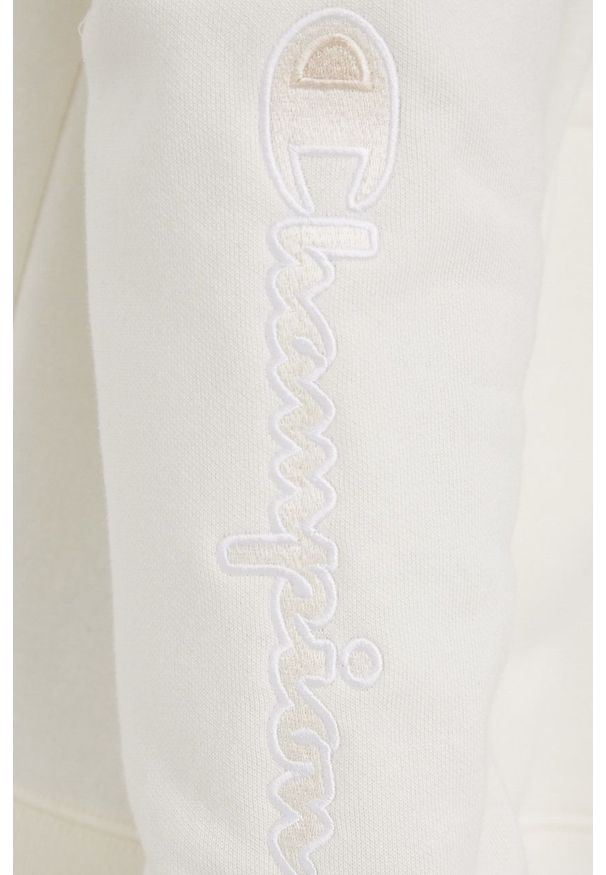 Champion bluza męska kolor beżowy z kapturem z aplikacją. Okazja: na co dzień. Typ kołnierza: kaptur. Kolor: beżowy. Długość: krótkie. Wzór: aplikacja. Styl: casual