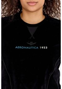 Aeronautica Militare - AERONAUTICA MILITARE Czarna welurowa bluza damska z wieloma zdobieniami. Kolor: czarny. Materiał: bawełna. Wzór: aplikacja