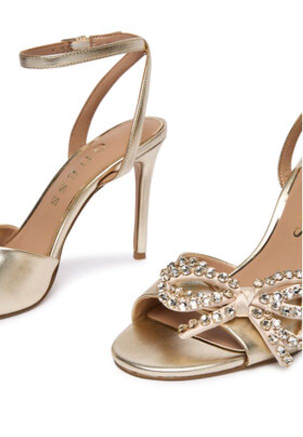 Guess Sandały FLFCR2 LEA03 Złoty. Kolor: złoty. Materiał: skóra