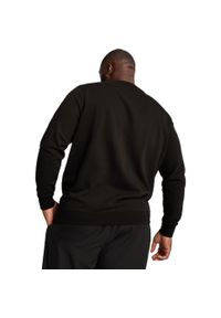 Bluzka Puma Ess Crew Tr, Mężczyźni. Kolor: czarny. Materiał: bawełna, materiał