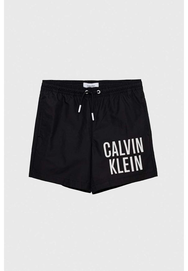 Calvin Klein Jeans szorty kąpielowe dziecięce kolor czarny. Kolor: czarny. Materiał: poliester, materiał. Wzór: nadruk