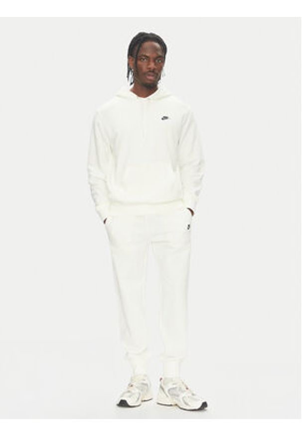 Nike Spodnie dresowe FN3801 Écru Regular Fit. Materiał: bawełna