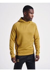 Bluza z kapturem Hummel Cima XK. Typ kołnierza: kaptur. Kolor: beżowy. Materiał: materiał. Wzór: nadruk