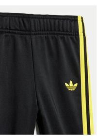 Adidas - adidas Dres Smiley World SST JD2874 Czarny Regular Fit. Kolor: czarny. Materiał: syntetyk