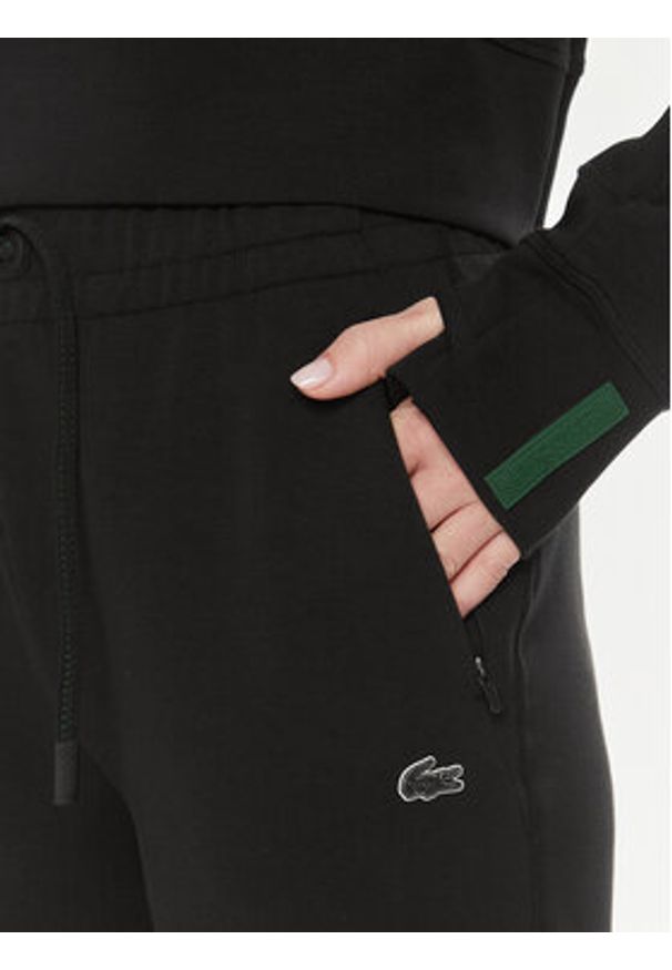 Lacoste Spodnie dresowe XF0343 Czarny Regular Fit. Kolor: czarny. Materiał: bawełna