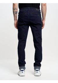 Big-Star - Spodnie chinosy męskie jeansowe granatowe Logan 784. Kolor: niebieski