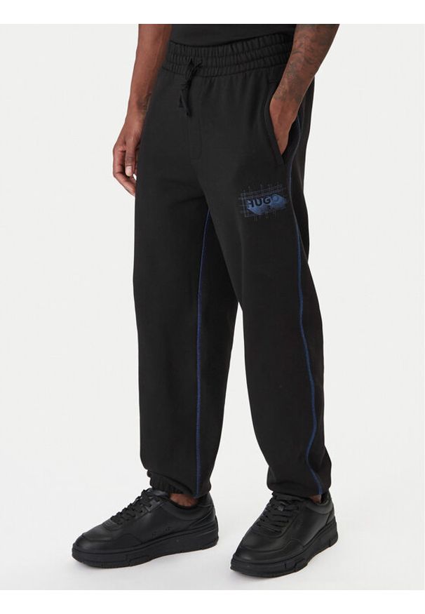 Hugo - HUGO Spodnie dresowe Notharos 50553508 Czarny Regular Fit. Kolor: czarny. Materiał: bawełna