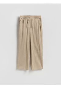 Reserved - Spodnie z wiązaniem - beżowy. Kolor: beżowy. Materiał: len, dzianina