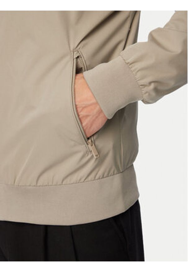 Calvin Klein Kurtka bomber LV040FM512 Beżowy Regular Fit. Kolor: beżowy. Materiał: syntetyk