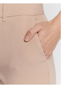 Marciano Guess Spodnie materiałowe 1BGB11 9653Z Beżowy Slim Fit. Kolor: beżowy. Materiał: materiał, syntetyk