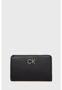 Calvin Klein Portfel damski kolor czarny. Kolor: czarny. Materiał: materiał. Wzór: gładki