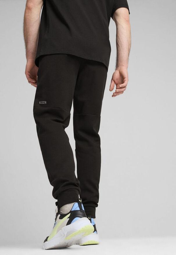 Puma - Męskie spodnie RAD/CAL PUMA Black. Kolor: czarny. Materiał: dzianina. Sport: fitness