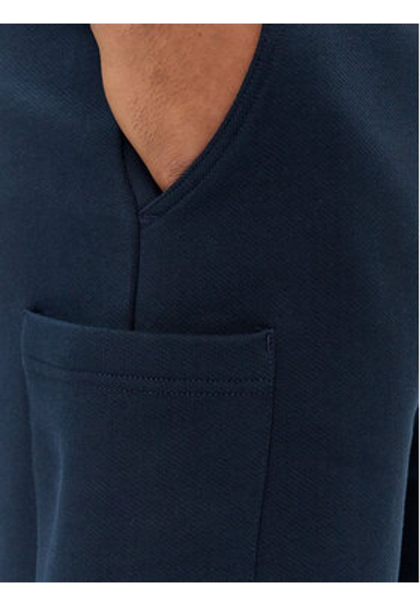 Tommy Jeans Szorty sportowe Badge DM0DM18479 Granatowy Regular Fit. Kolor: niebieski. Materiał: bawełna. Styl: sportowy