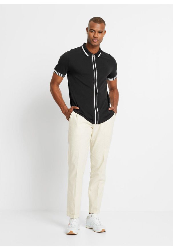 bonprix - Koszulka polo z zamkiem z bawełnianej piki. Typ kołnierza: polo. Kolor: czarny. Materiał: bawełna. Styl: elegancki