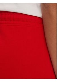 Tommy Jeans Szorty sportowe New Cls DW0DW17772 Czerwony Relaxed Fit. Kolor: czerwony. Materiał: bawełna