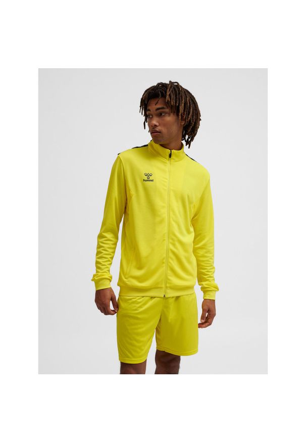 Bluza dresowa z poliestru zapinana na zamek błyskawiczny Hummel Authentic. Kolor: żółty. Materiał: dresówka, poliester. Sport: fitness