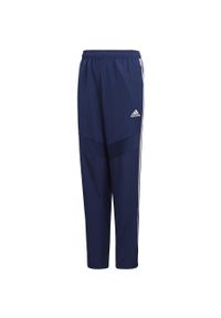 Adidas - Spodnie piłkarskie dla dzieci adidas Tiro 19 Woven Pants JUNIOR. Kolor: niebieski