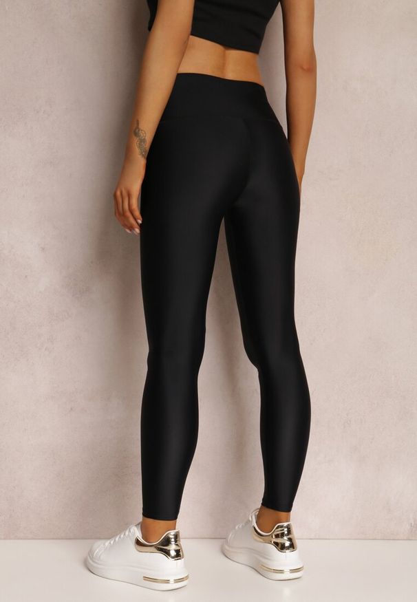 Renee - Czarne Legginsy Emilyse. Stan: podwyższony. Kolor: czarny. Materiał: dzianina. Długość: długie. Wzór: jednolity, kolorowy. Styl: sportowy