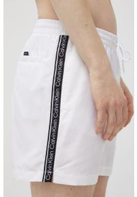 Calvin Klein szorty kąpielowe kolor biały. Kolor: biały. Materiał: poliester, materiał. Wzór: aplikacja #4