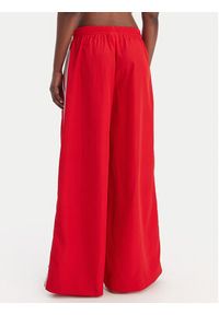 Adidas - adidas Spodnie dresowe Firebird Adilenium KD6299 Czerwony Regular Fit. Kolor: czerwony. Materiał: syntetyk #5