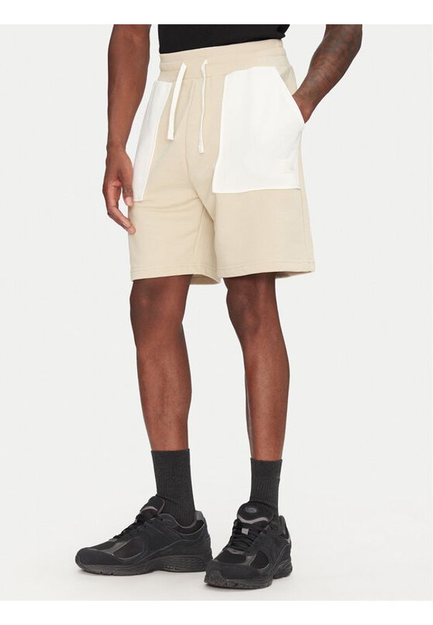 The North Face Szorty sportowe Terry NF0A8C29 Beżowy Regular Fit. Kolor: beżowy. Materiał: bawełna. Styl: sportowy