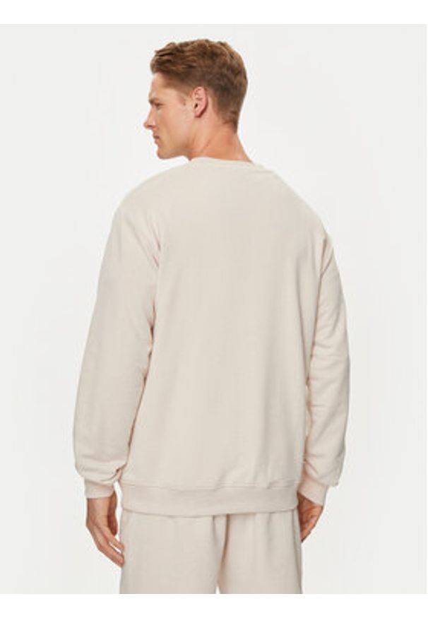 Fila Bluza FAM0671 Beżowy Relaxed Fit. Kolor: beżowy. Materiał: bawełna