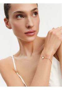 Guess Bransoletka Lovely Guess JUBB03 036JW Żółte złocenie. Materiał: metalowe. Kolor: złoty