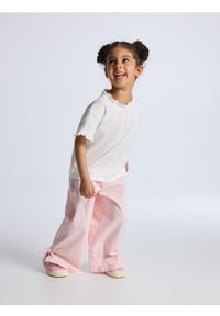 Reserved - Bawełniane spodnie z haftem - pastelowy róż. Kolor: różowy. Materiał: bawełna. Wzór: haft #1