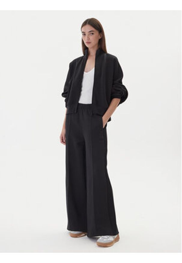 Adidas - adidas Spodnie dresowe adicolor Spacer 3-Stripes JV7500 Czarny Wide Leg. Kolor: czarny. Materiał: bawełna. Sport: turystyka piesza