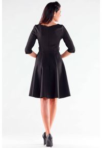 Awama - Elegancka sukienka rozkloszowana z ozdobnymi guzikami czarna. Okazja: do pracy. Kolor: czarny. Styl: elegancki #4