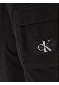 Calvin Klein Jeans Spodnie dresowe J30J324696 Czarny Skinny Fit. Kolor: czarny. Materiał: bawełna #4