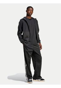 Adidas - adidas Spodnie dresowe Adibreak IW3482 Czarny Loose Fit. Kolor: czarny. Materiał: syntetyk