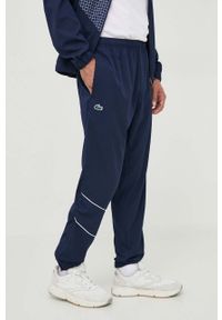 Lacoste dres męski kolor granatowy. Kolor: niebieski. Materiał: dresówka #2