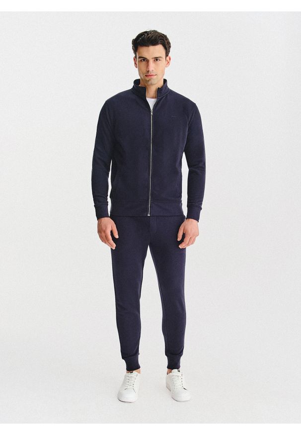 Pako Lorente - PAKO LORENTE – Granatowe spodnie dresowe. Okazja: na co dzień. Kolor: niebieski, szary. Materiał: dresówka. Wzór: gładki. Styl: casual