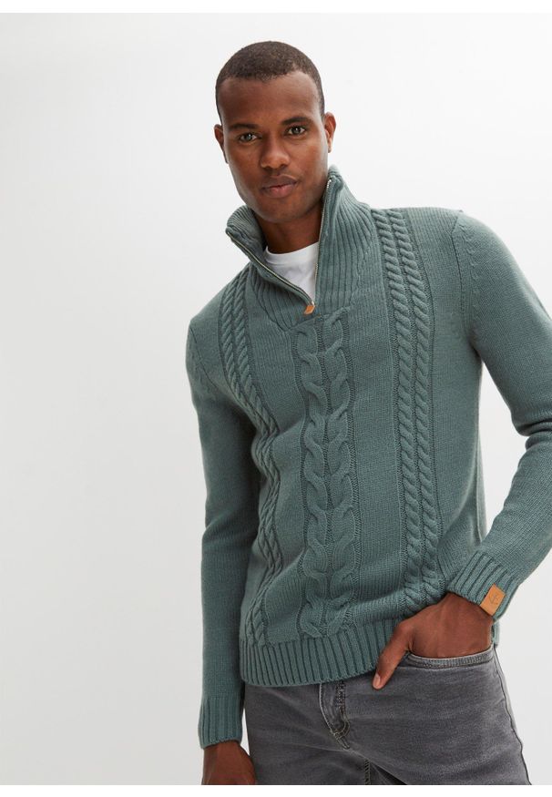bonprix - Sweter z wysokim kołnierzem zapinanym na zamek z grubej dzianiny, we wzór w warkocze. Typ kołnierza: kołnierzyk stójkowy. Kolor: zielony. Materiał: dzianina, skóra