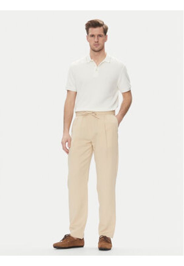 Marciano Guess Spodnie materiałowe 5GHB03 2310Z Beżowy Regular Fit. Kolor: beżowy. Materiał: syntetyk