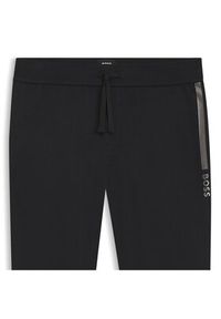 BOSS Spodnie dresowe Authentic 50545565 Czarny Slim Fit. Kolor: czarny. Materiał: bawełna