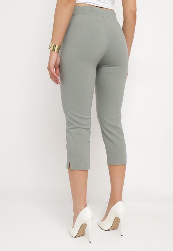 Born2be - Jasnozielone Spodnie o Długości 3/4 z Elastyczną Gumką w Pasie i Wiązaniem Cidasara. Kolor: zielony