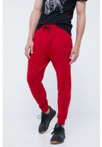 4f - 4F spodnie dresowe męskie kolor czerwony gładkie. Kolor: czerwony. Materiał: dresówka. Wzór: gładki