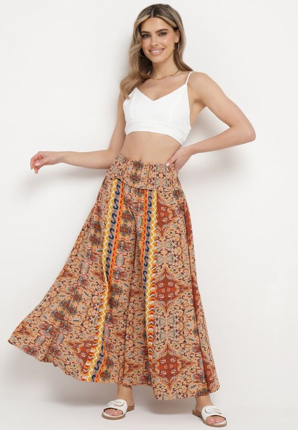 Born2be - Beżowo-Pomarańczowe Szerokie Spodnie Palazzo z Cienkimi Gumkami w Pasie i Wysokim Stanem Neana. Okazja: na spotkanie biznesowe, do pracy. Stan: podwyższony. Kolor: beżowy. Materiał: materiał. Długość: długie. Styl: biznesowy