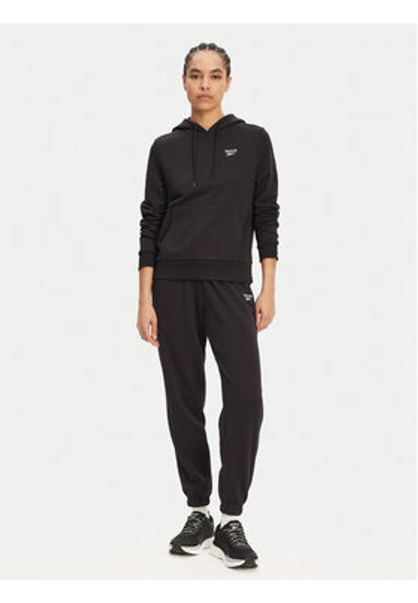 Reebok Spodnie dresowe 100071691 Czarny Regular Fit. Kolor: czarny. Materiał: bawełna