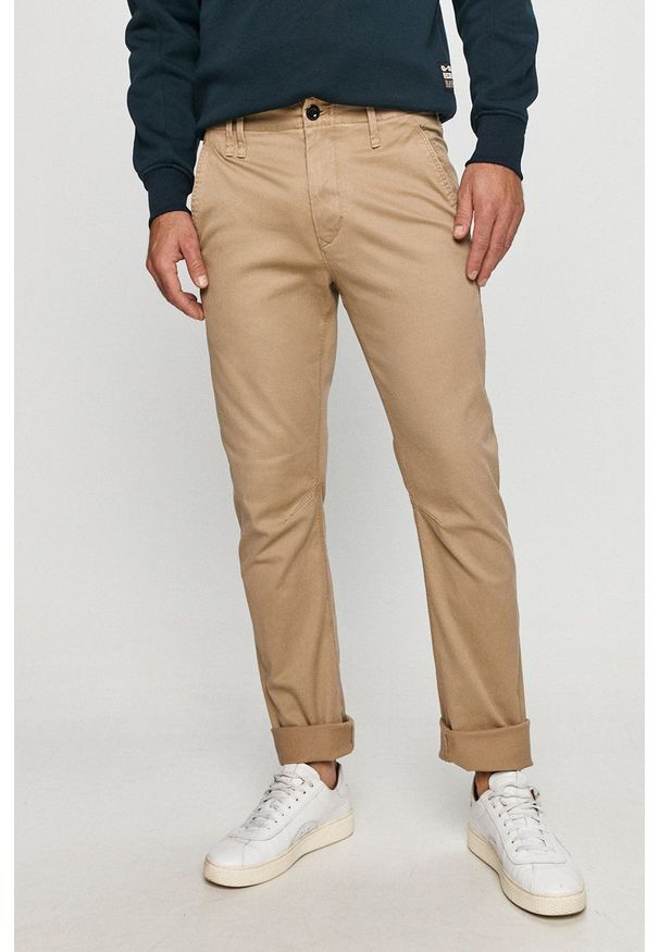 G-Star RAW - G-Star Raw - Spodnie. Kolor: beżowy. Materiał: tkanina. Wzór: gładki